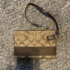Coach striped wristlet